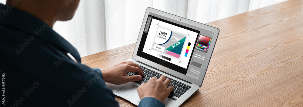 Poster graphic designer software for modern design of web page and commercial ads showing on the computer s