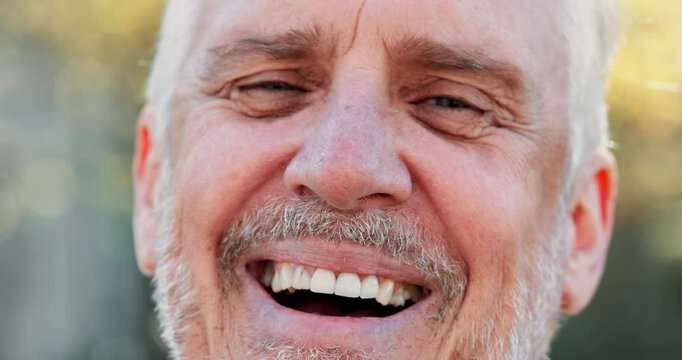 Face, laughing and smile of old man outdoor in nature for adventure, fitness or hiking closeup. Exercise, portrait and retirement with funny senior person in forest or park to explore New Zealand