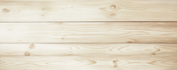 Obraz premium Light pine wooden backdrop with a soft, creamy color palette. The planks are smooth with subtle grain patterns, giving a clean and minimalist feel. Natural light enhances the wood's gentle texture,