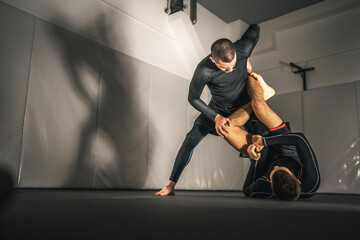 brazilian jiu jitsu bjj no gi grappling training two athletes practice