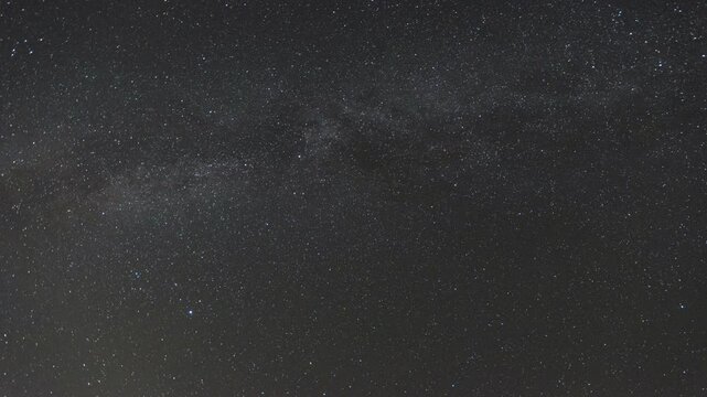 The Milky Way moving across the night sky. Captures the mesmerizing motion of stars and cosmic detail in a clear, dark sky
