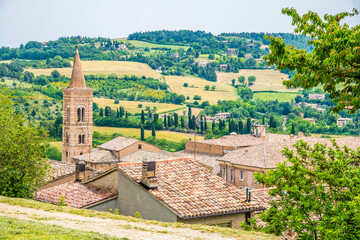 A view from the Fortress Albornoz towards the edge of the city in Urbino, Italy in summertime