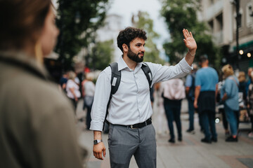 Young businessman with backpack waving while navigating through a crowded urban street....