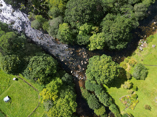 Dartmeet, Dartmoor, Devon, England: DRONE VIEW: Overhead view of the confluence of the East Dart...