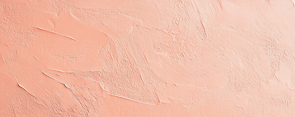 A light pastel coral surface with a fine, grainy texture. The warm, soft tone and delicate texture create a cheerful and inviting background.