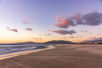 Sunset Serenity in Tarifa: Coastal Beauty with Mountain Views