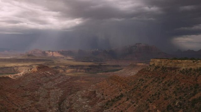 4k Slow motion video of three lightning strikes near West Temple Mt. Zion Nat. Park, Utah, USA during a summer storm. The first strike is to the west of the peak and the second and third to the east.