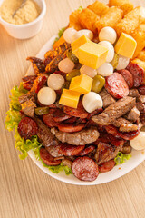 dish with onion, quail egg, pepperoni and cheese, meat
