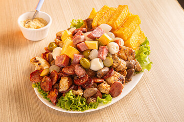 dish with onion, quail egg, pepperoni and cheese, meat
