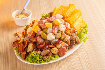dish with onion, quail egg, pepperoni and cheese, meat
