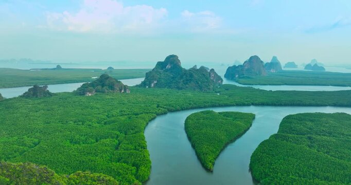 Aerial drone view of heart shape Island of Love in mangrove forest 
beautiful green mangrove forest sea water. Heart shaped Island.view over heart island.archipelago and mangrove forest background