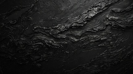    a black surface, featuring wavy patterns on its front, side, and back