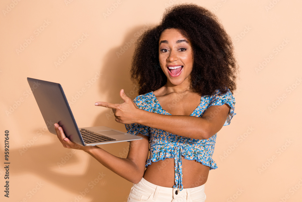 Sticker photo of adorable lovely girl wear blue top showing finger modern device empty space isolated beige 