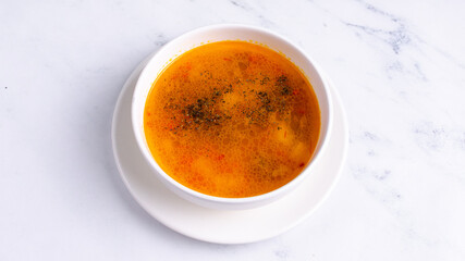 Chicken soup bowl top view isolated