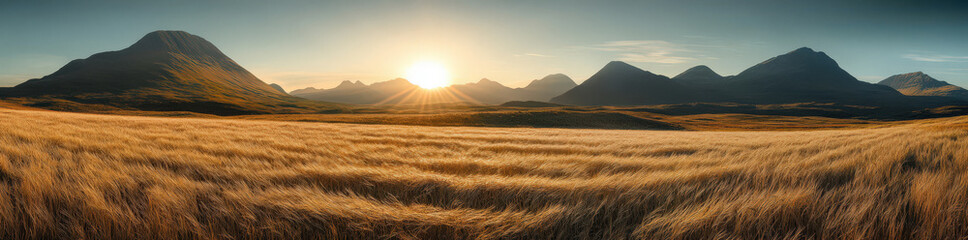 Majestic Mountain Range with Golden Grass Field at Sunset