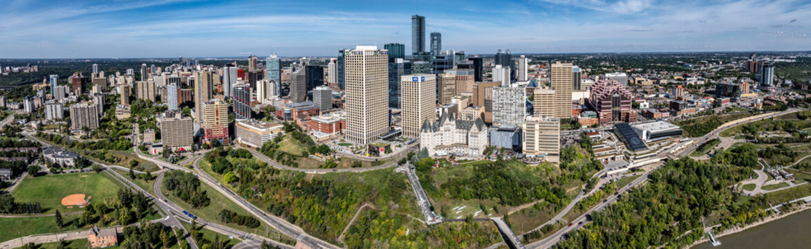 Edmonton, AB, Canada, panoramic aerial view of Edmonton Downtown skyline with historic, modern buildings, skyscrapers. Situated on the "North Saskatchewan River" in Canadian province Alberta