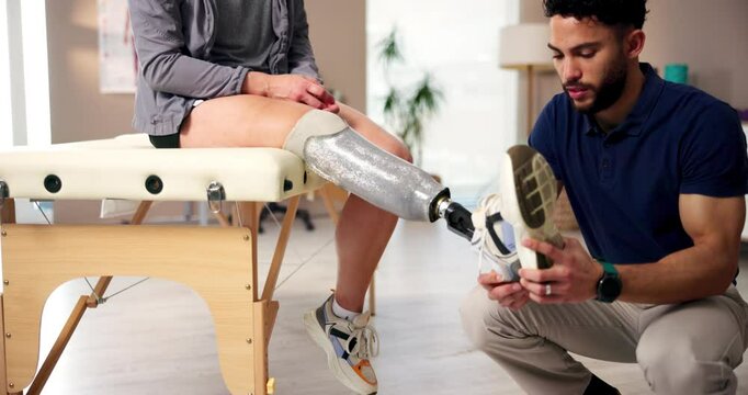 Physiotherapy, amputee and leg with people and help for person with a disability, rehabilitation and medical prosthetic. Healthcare, consulting and physical therapy with man and woman in clinic