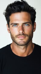 Fototapeta premium Handsome male model posing with neutral expression