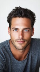 Fototapeta premium Handsome male model posing on white background