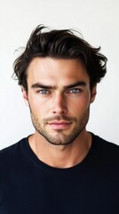 Handsome male model posing on white background