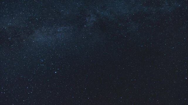 The Milky Way moving across the night sky. Captures the mesmerizing motion of stars and cosmic detail in a clear, dark sky