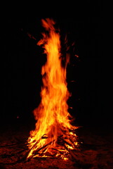 Fototapeta premium fire burning with flames isolated against black background