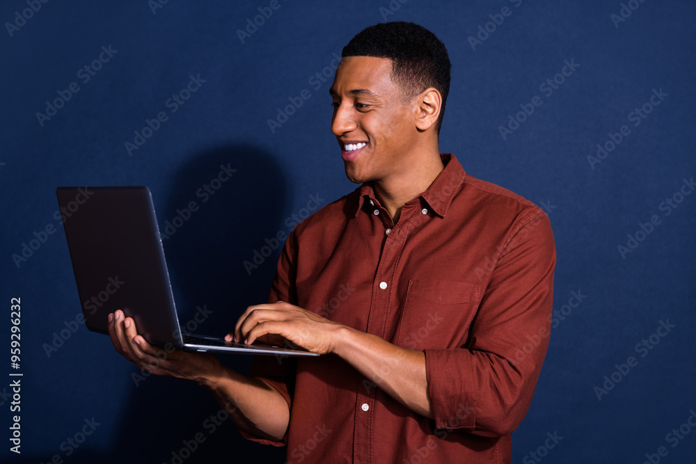 Canvas Prints Photo of handsome guy wear casual shirt communicating instagram twitter telegram facebook isolated blue color background