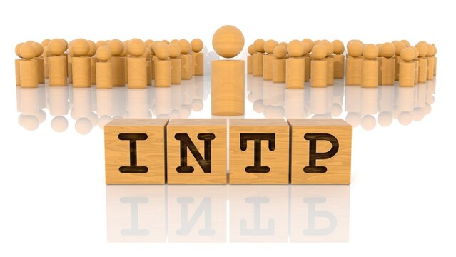 INTPの文字が印字された木製ブロックと木製棒人間