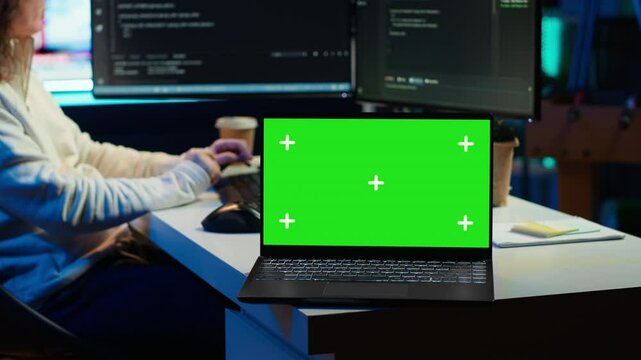 Programmer designing and developing software applications using isolated screen laptop. IT professional implementing and maintaining company systems using mockup notebook, camera A