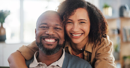 Couple, happy and hug portrait in home for romance, support and commitment in marriage with love. Interracial people, security and embrace in living room of house for loyalty, comfort and affection