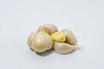 Bawang putih or garlic cloves isolated on white background