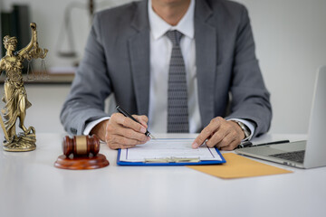 Close up of Judge gavel with Justice lawyers, Business senior man in suit or lawyer working on a documents. Legal law, advice and justice concept.
