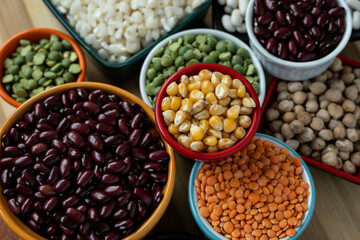 several pots with raw grains for preparing healthy food