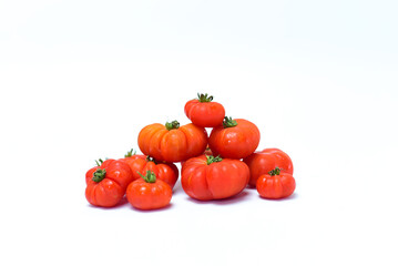 Beefsteak tomatoes, isolated on white. Top view and side view. Also call tomat labu in Indonesia