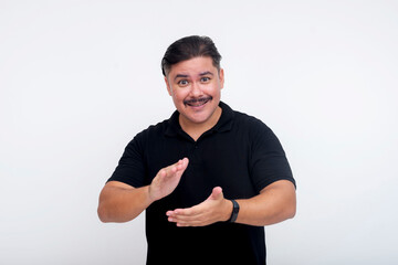 A middle-aged man clapping, acknowledging and encouraging a person's attempts or actions to please...