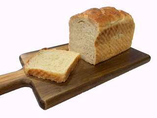 A golden, freshly baked artisan sourdough loaf rests on a rustic wooden board. Its crisp crust and soft, airy interior highlight the craftsmanship and attention to detail in every slice.