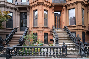 New York City, row of old brownstone townhouses with bay windows