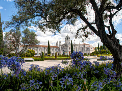 Portugal, Lisbon. The Jeronimos Monastery (Mosteiro dos Jeronimos) from the Praca do Imperio, Belem District.