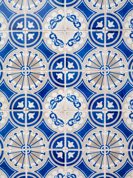 Portugal, Aveiro. Colorful azulejo tiles on the exterior wall of house.
