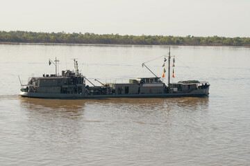 navy warship sailing on a river war 