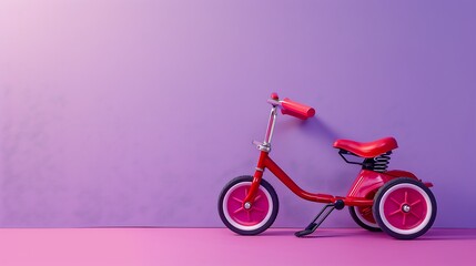 Fototapeta premium kids tricycle isolated on purple and pink background