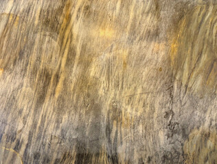 Contrast rough and raw Gold or golden textured paint washed on a wall or panel, seamless texture,...