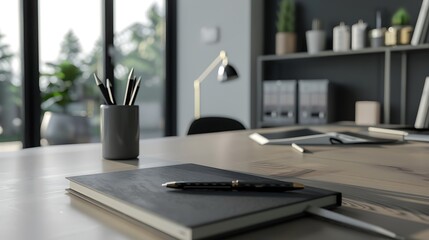 Office desk gray table with pen wood block notebook and house
