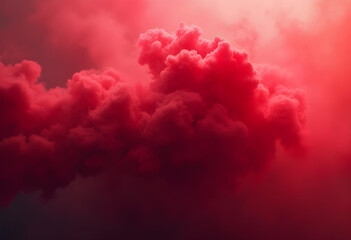 A red voluminous cloud formed against the sky. The clouds are billowing and voluminous, creating a dramatic and dynamic composition