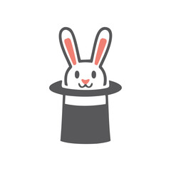 Rabbit in hat. White bunny rabbit peeking out of a black magic hat.
