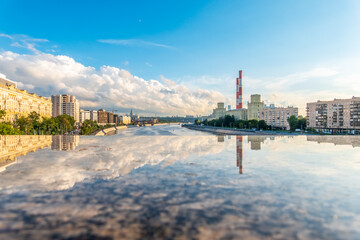 Naklejka premium View of Berezhkovskaya Embankment in Moscow with reflection on a mirror stone surface