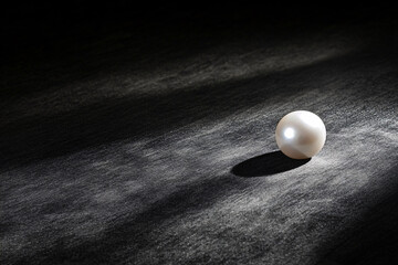 Shiny Pearl on a Dark Surface - Simple Elegance