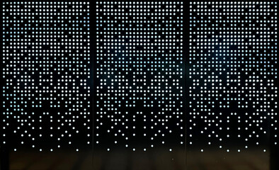 Beautiful laser cut screens in random square pixelated mode with LED backlights shining from behind.