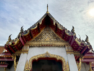 Naklejka premium Wat Benchamabophit Dusitwanaram, or commonly known as marble temple, is a famous Buddhist temple carved from white marbles at Dusit District, Bangkok, Thailand.