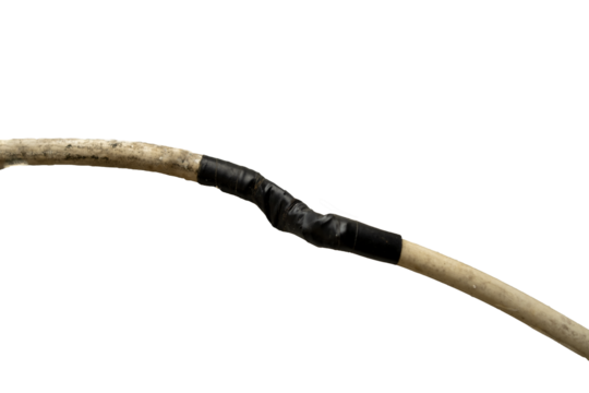 Damaged electrical cable is being repaired with black electrical tape to join both ends on transparent background